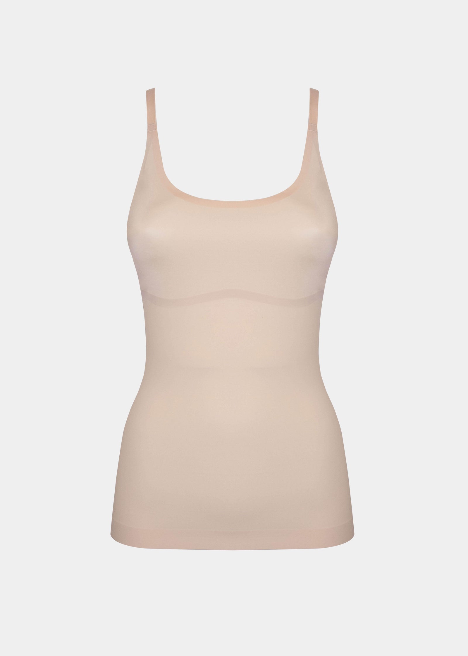 Still product image of Tone Your Body Cami in latte, body-contouring sleek cami. Smooth powerful recycled fabric providing firm shaping for tummy, waist, and back, with seamless edges, no shaping at the bust, and adjustable spaghetti straps visible.