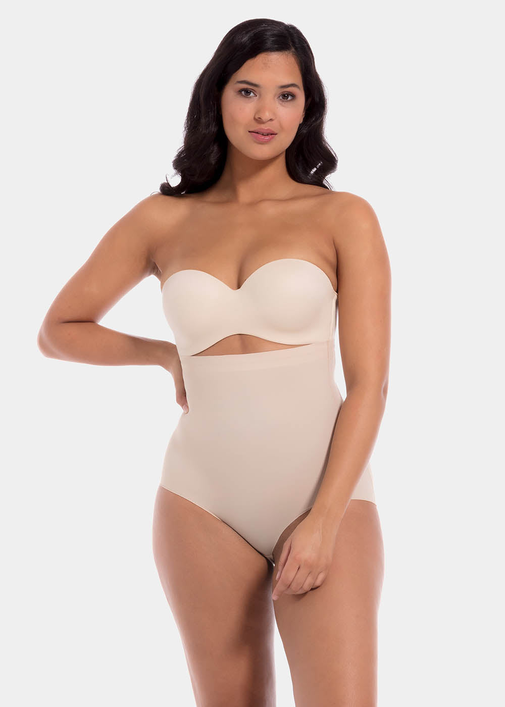 Front view of a model wearing Maxi Sexy Hi-Brief in latte, high-waist shaping brief. Smooth powerful fabric providing firm control for tummy, waist, and back, with seamless edges and silicone-trimmed waistband visible.