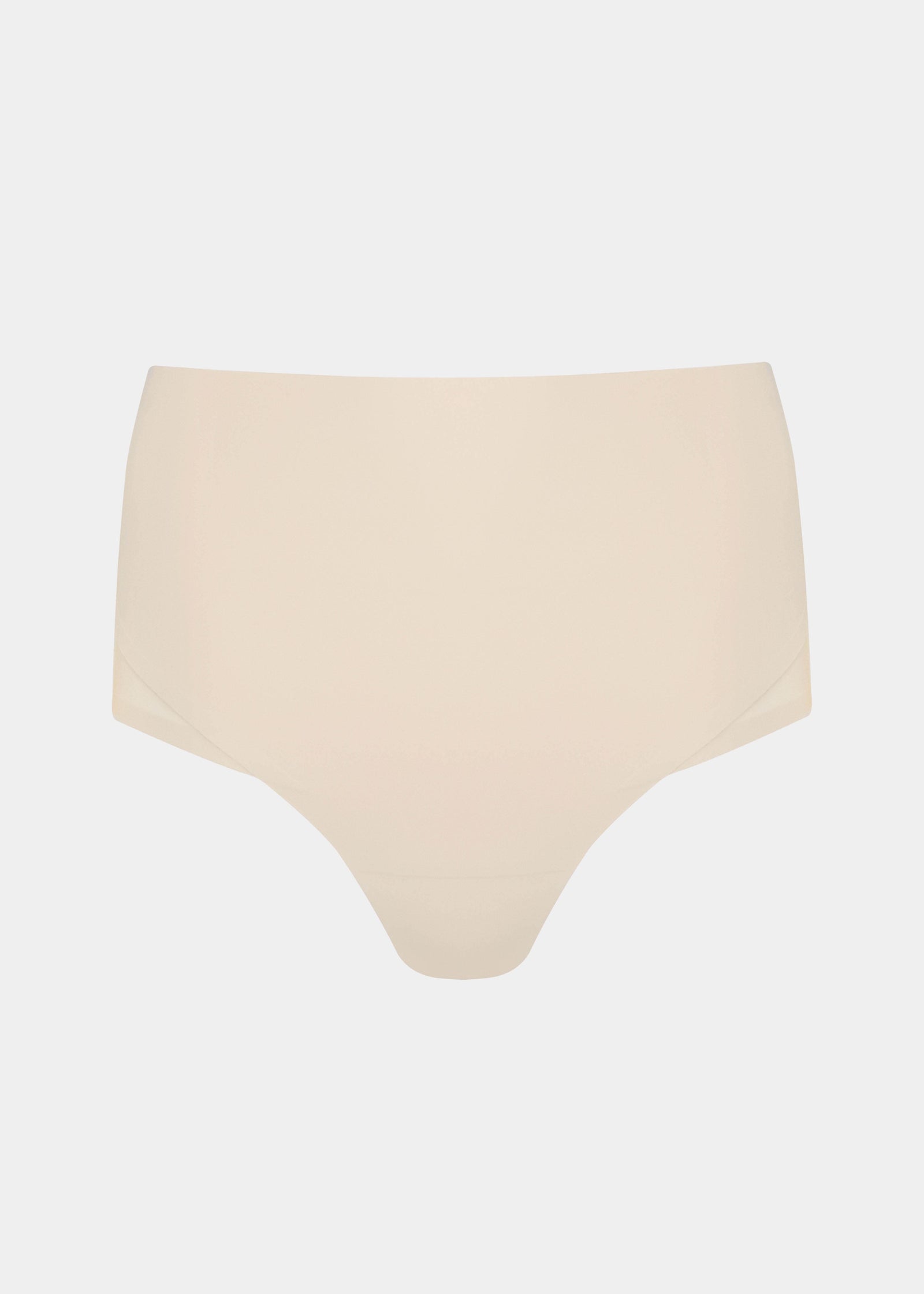 Still product image of Sheer & Sexy Brief in latte, mid-waist shaping brief. Smooth fabric with sheer mesh panels, medium shaping for tummy and lower back, and subtle lift zone at the buttocks, with seamless edges for invisible wear.