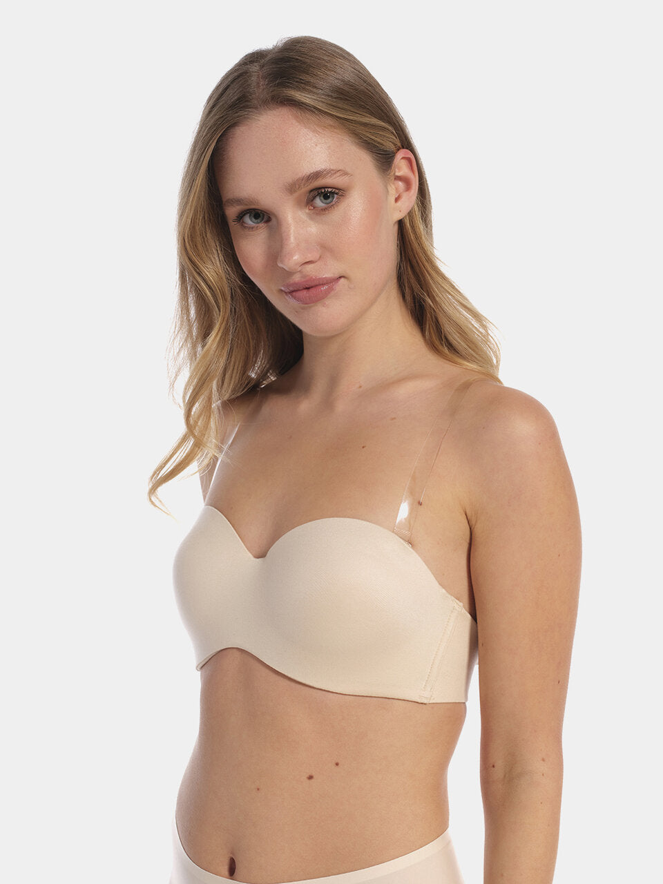 Front view of a model wearing a bra with removable transparent silicone straps, featuring adjustable clear 15-millimeter-wide straps that provide a seamless, discreet look under clothing.