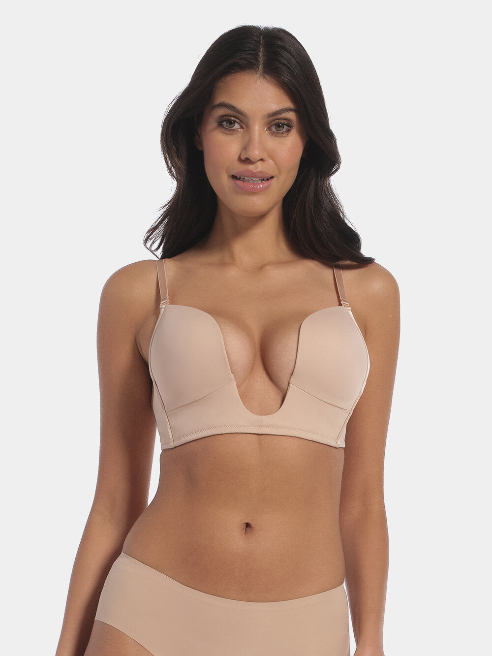 This image features a model wearing a V-Bra, which is designed to be nearly invisible under clothing with low plunge necklines. The bra boasts a deep cleavage front and an extra low back, making it ideal for seamless coverage.
