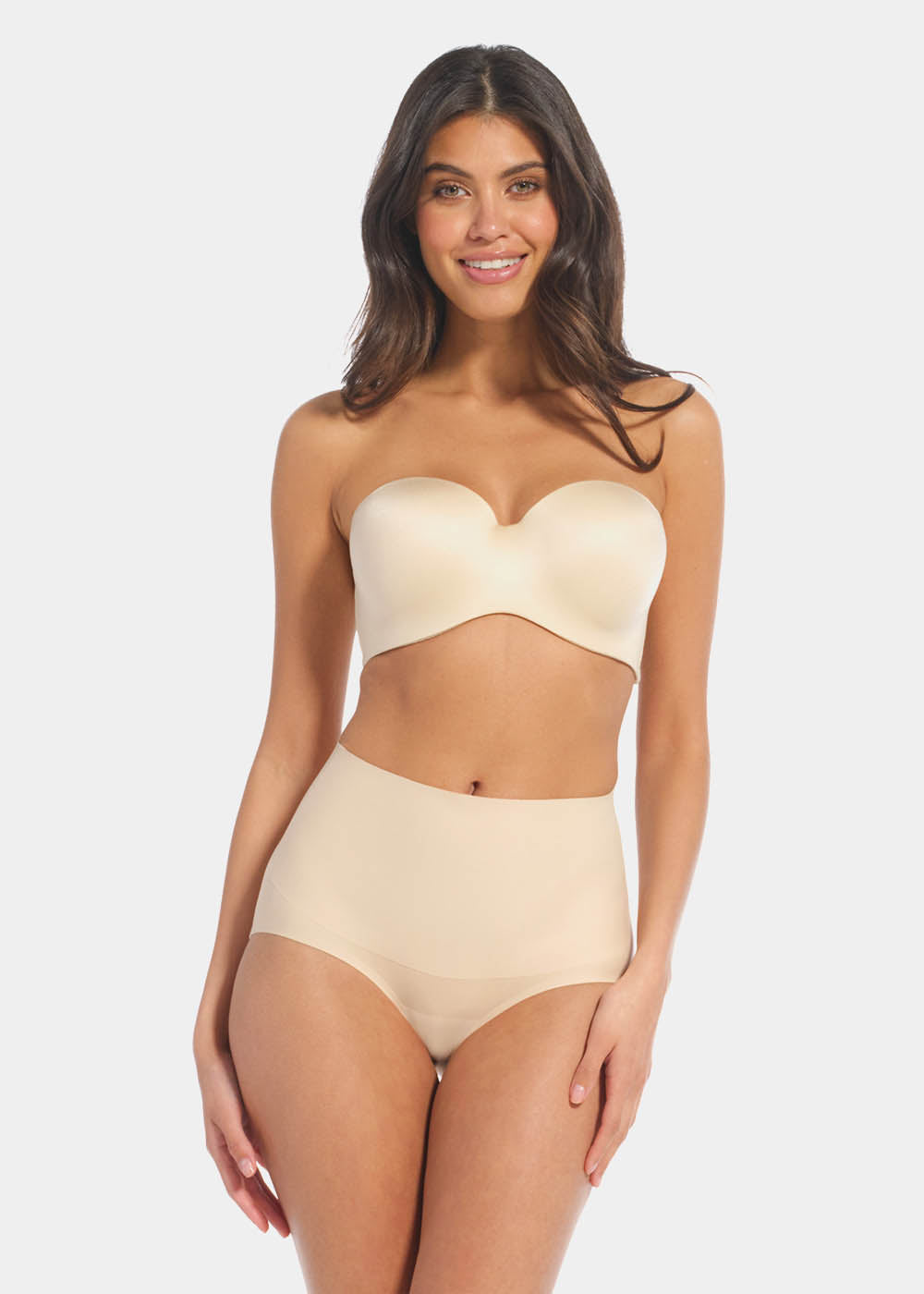 Front view of a model wearing Tummy Shaper in latte, mid-waist shaping brief with double-layer waistband. Seamless design with smooth fabric and full coverage front, providing firm shaping at the tummy area.