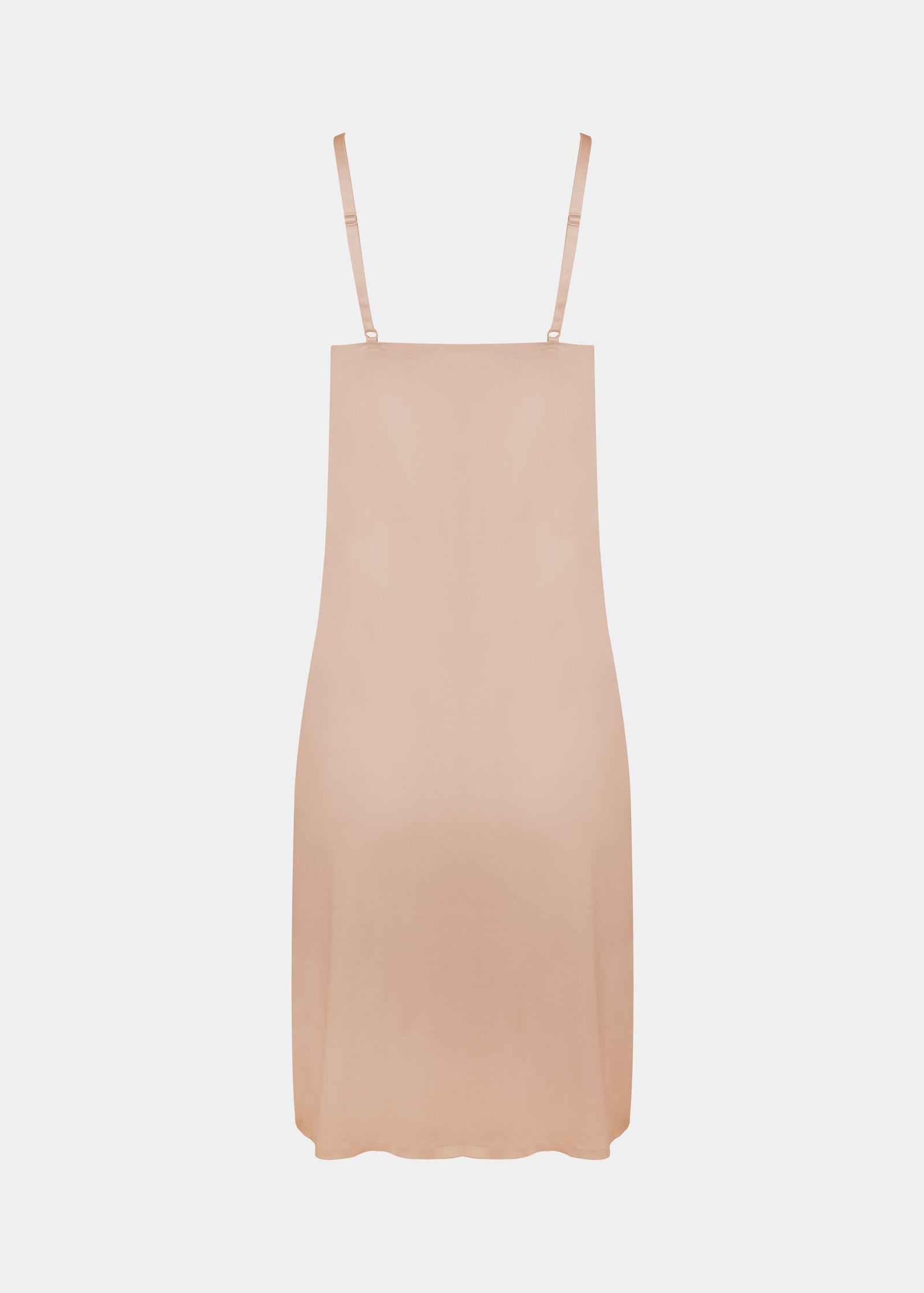 Still product image of Everyday Underdress in cappuccino shown from the back. Lightweight underdress with adjustable straps, smooth flowy fabric, and relaxed fit, designed as an invisible base layer under clothing.