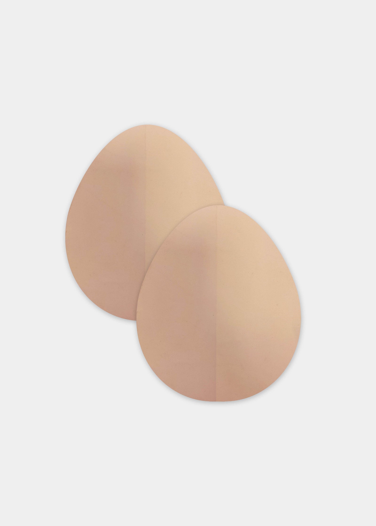 Still product image of the caramel-colored Beverly Hills Secret breast lift tapes, showcasing the ultra-thin adhesive tape pieces designed to lift and support the bust for an invisible finish under clothing.