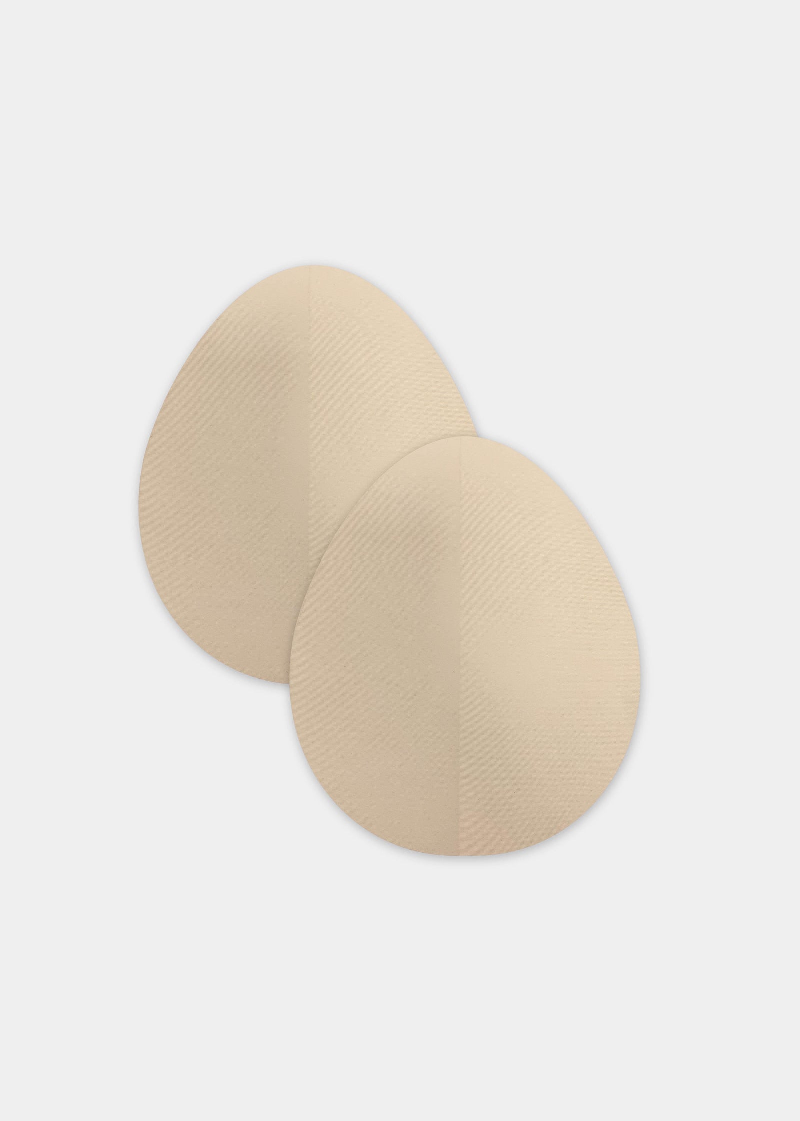 Still product image of the latte-colored Beverly Hills Secret breast lift tapes, showcasing the ultra-thin adhesive tape pieces designed to lift and support the bust for an invisible finish under clothing.