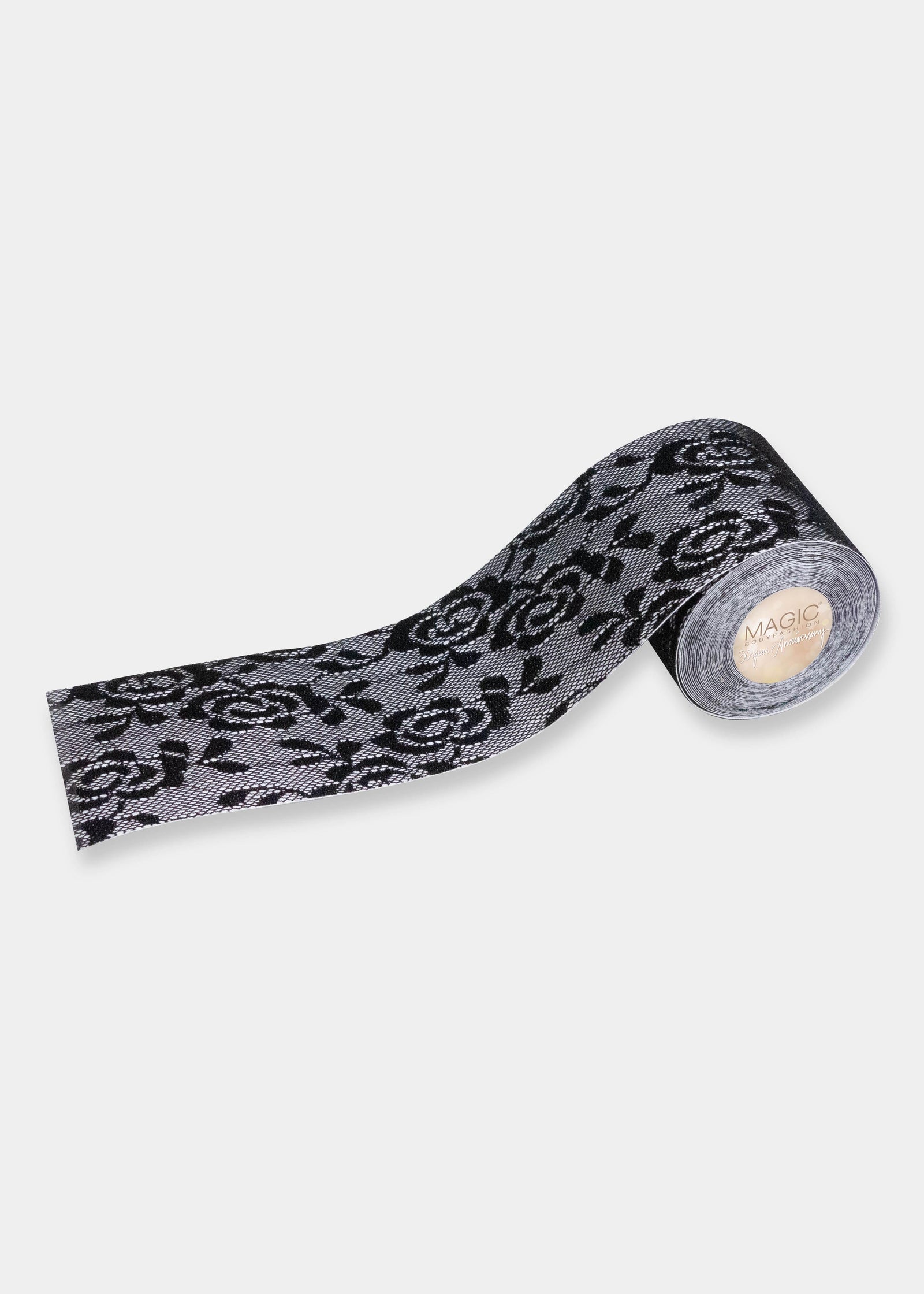 Still product image of the black Luxury Lace Boob Tape, showcasing the roll of lace-finish adhesive tape designed to lift and shape the bust.