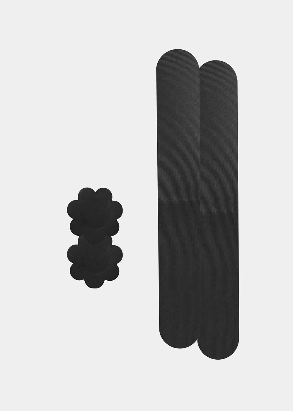 Still product image of the black Celebrities Breast Tape, showcasing the adhesive breast tape pieces designed to lift and support the bust for a smooth, invisible look under clothing.