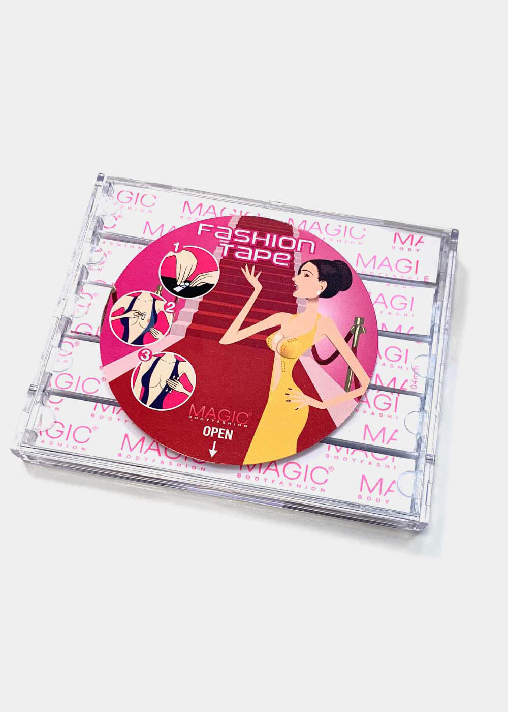 Still product image of the MAGIC Fashion Tape travel case, showing the clear storage box with multiple transparent adhesive tape strips inside.
