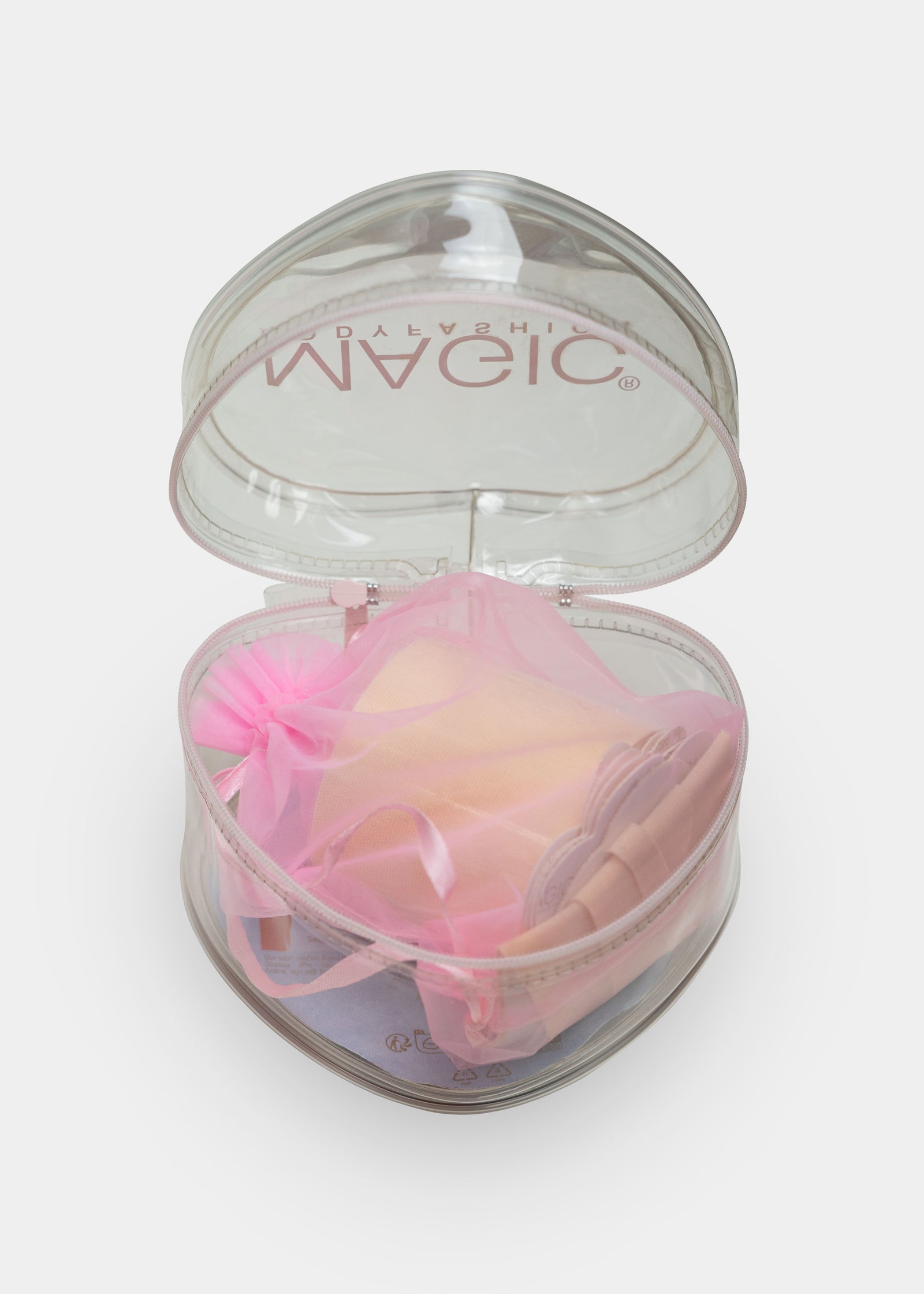 Heart-shaped box with all types of tape inside on a white background