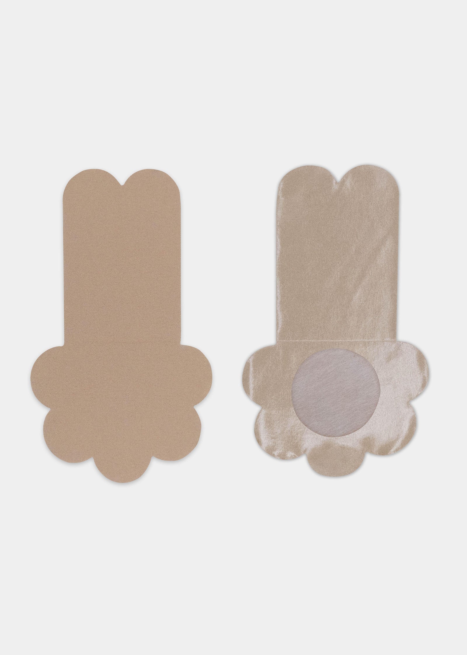 Still product image of the caramel-colored Secret Lift Covers, displayed to show both the front and back, highlighting the smooth outer surface and the inner adhesive design with an adhesive-free center for comfort.