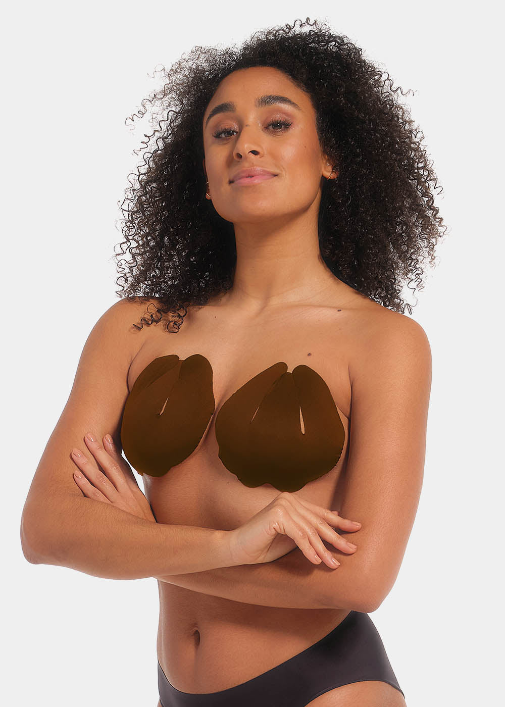 Front view of a model wearing the chocolate-colored Sculpting Breast Tape, showcasing the adhesive tape lifting and supporting the bust while creating a strapless, backless, and invisible look under clothing.