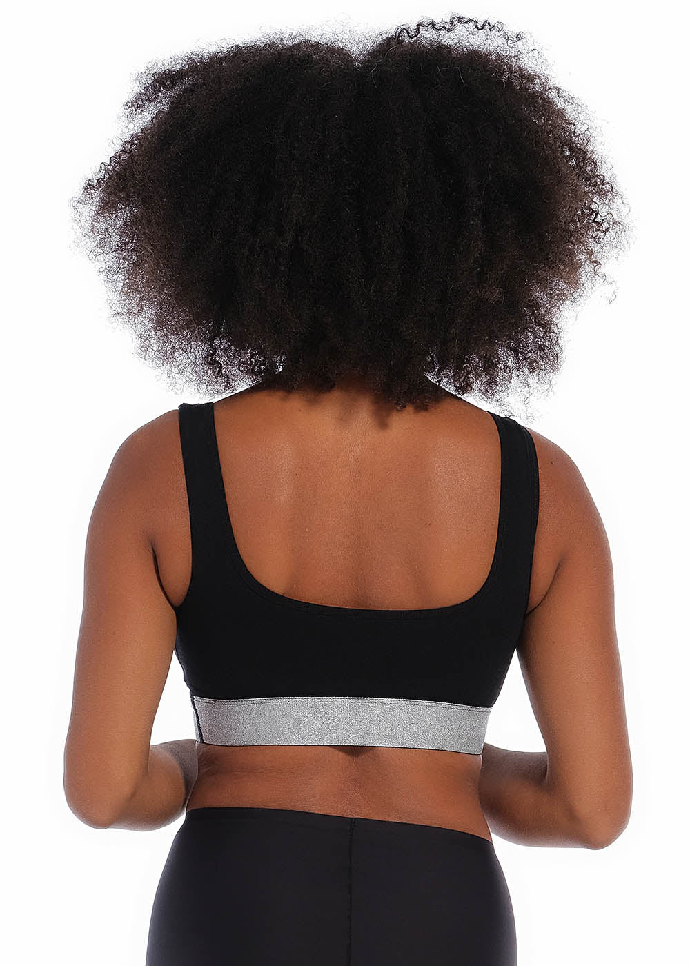 Back view of a model wearing the Salsa Bra, showcasing the smooth, seamless back design with wide supportive straps and a clean, wireless finish for all-day comfort.