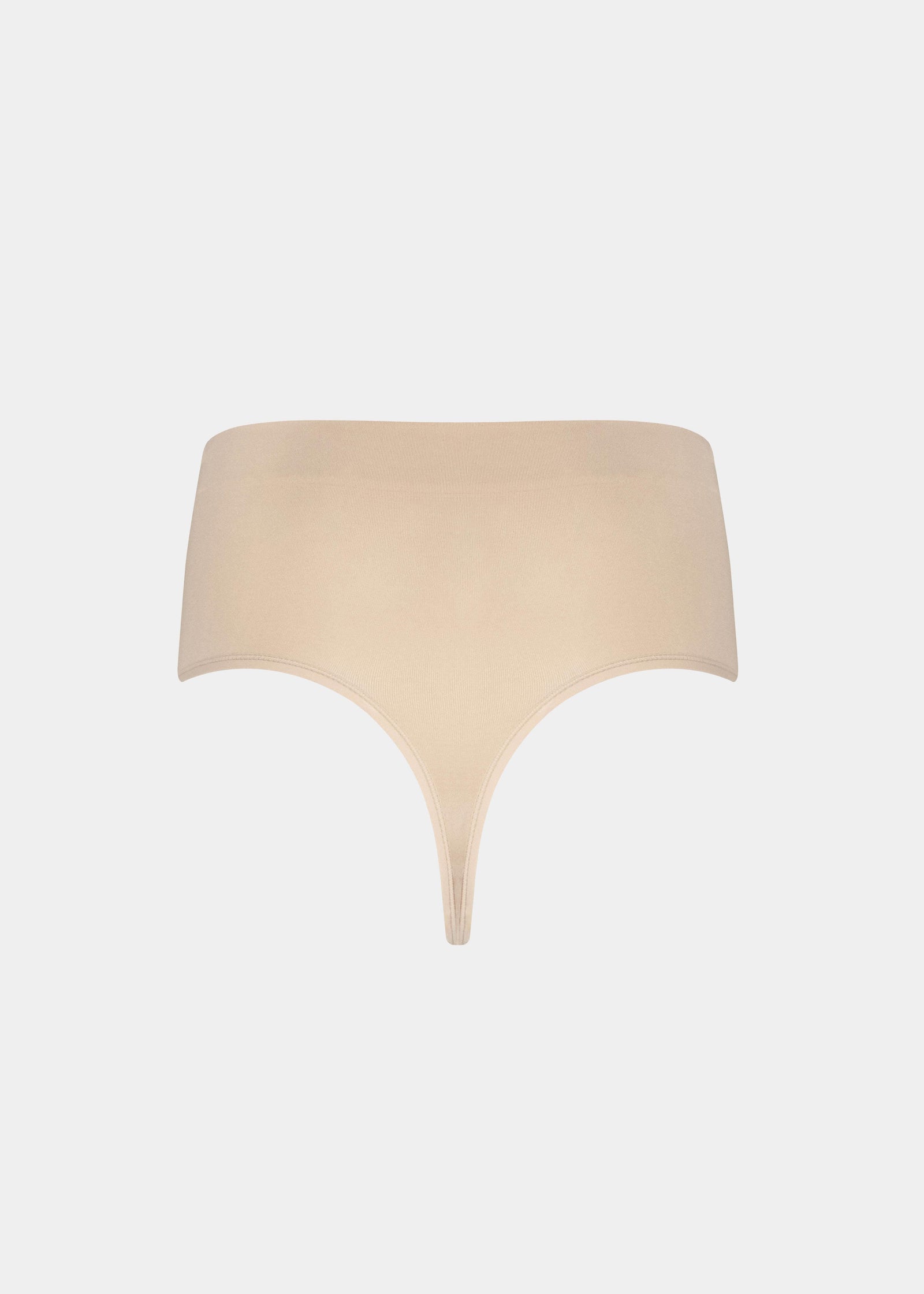 Back product view of the Comfort Thong, showcasing the seamless, lightweight fabric with a smooth, minimal design and invisible finish.
