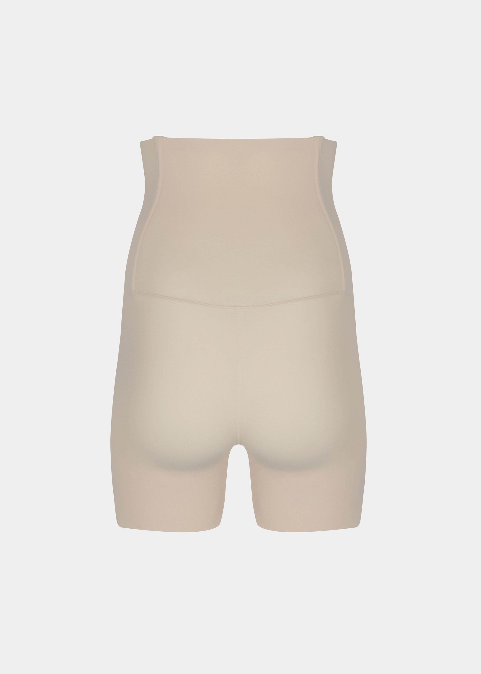 A high-waisted lattte Body Control Bermuda. Still product back view