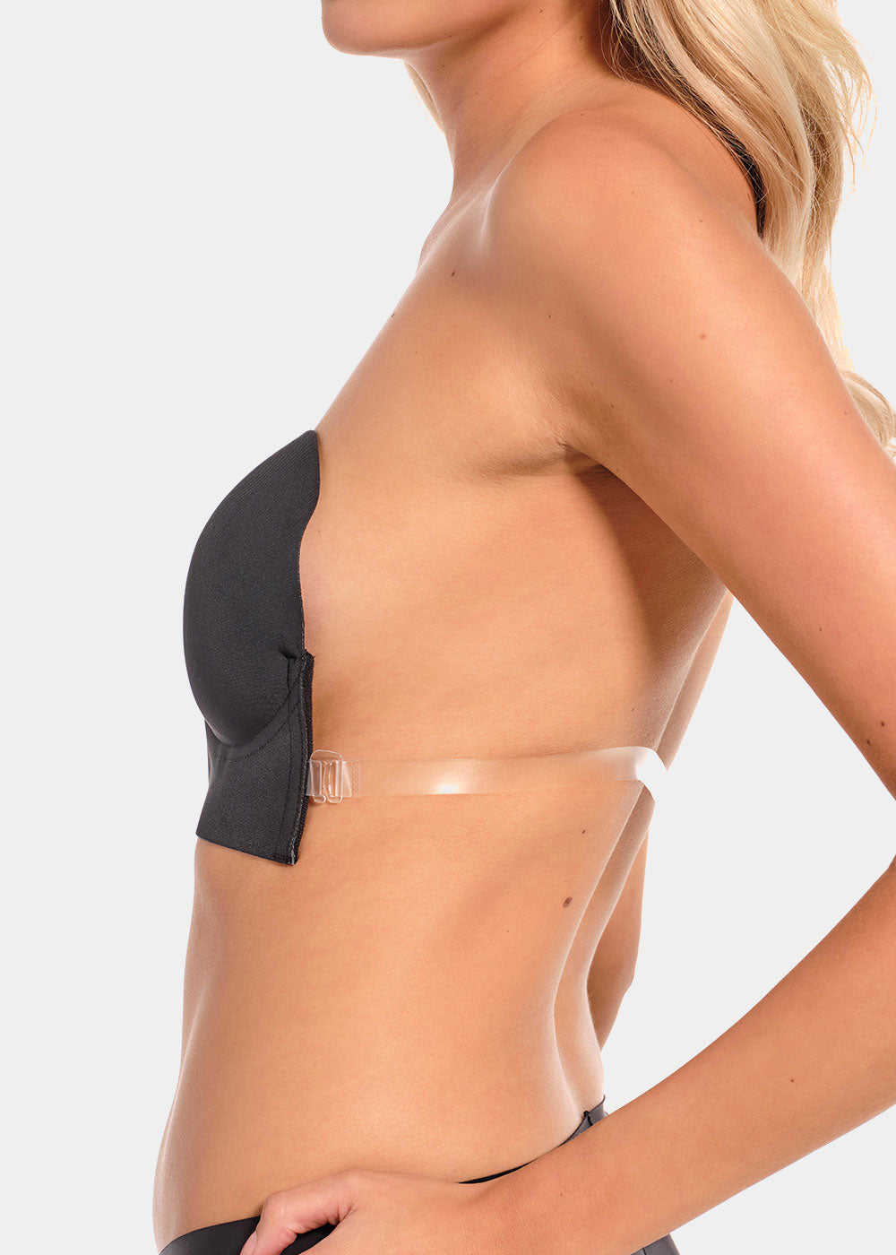 Partial view of a person wearing a black LUve Bra and clear sidestraps on a light gray background