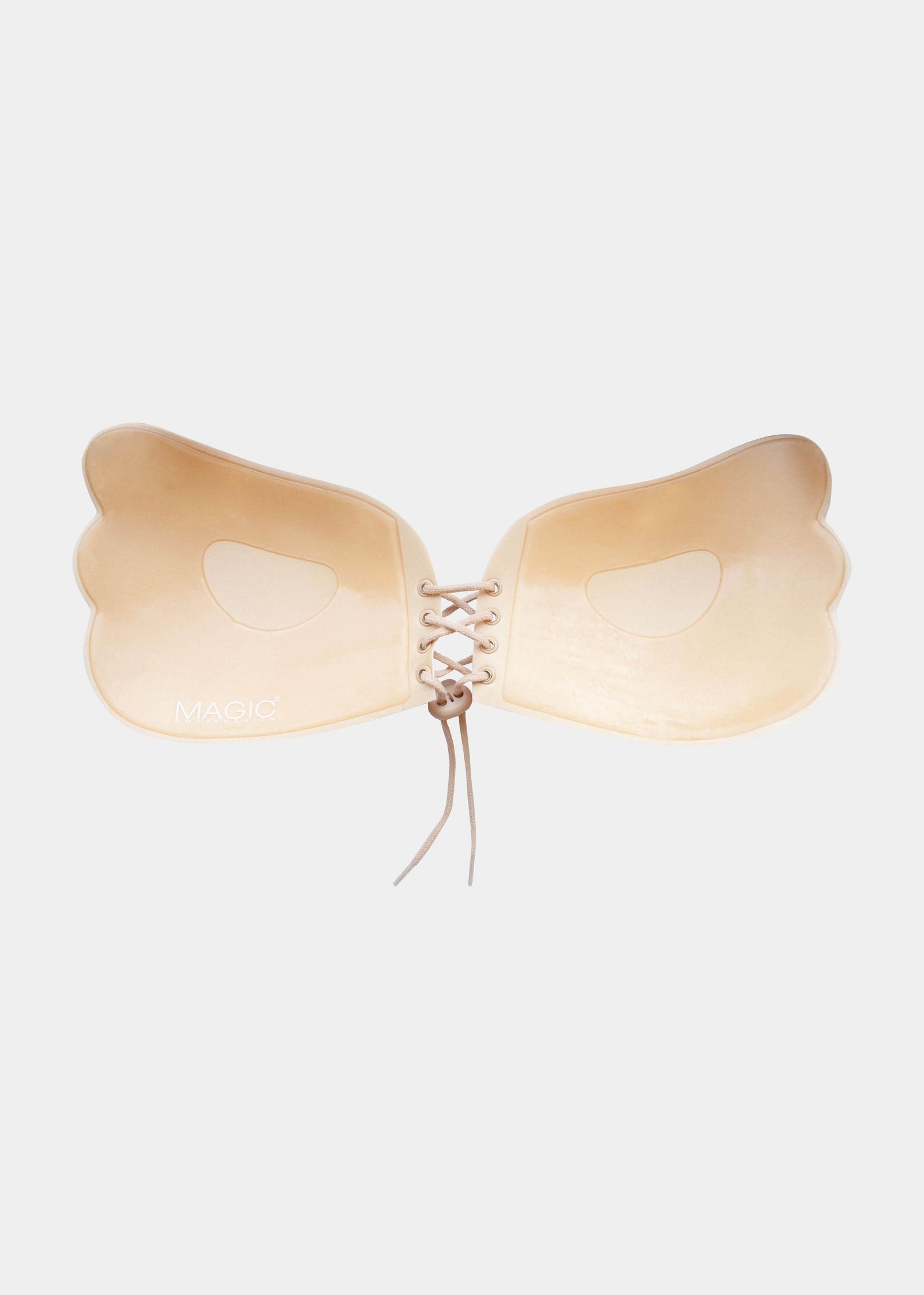 Inside of the Latte, backless, strapless adhesive bra with a drawstring front closure.