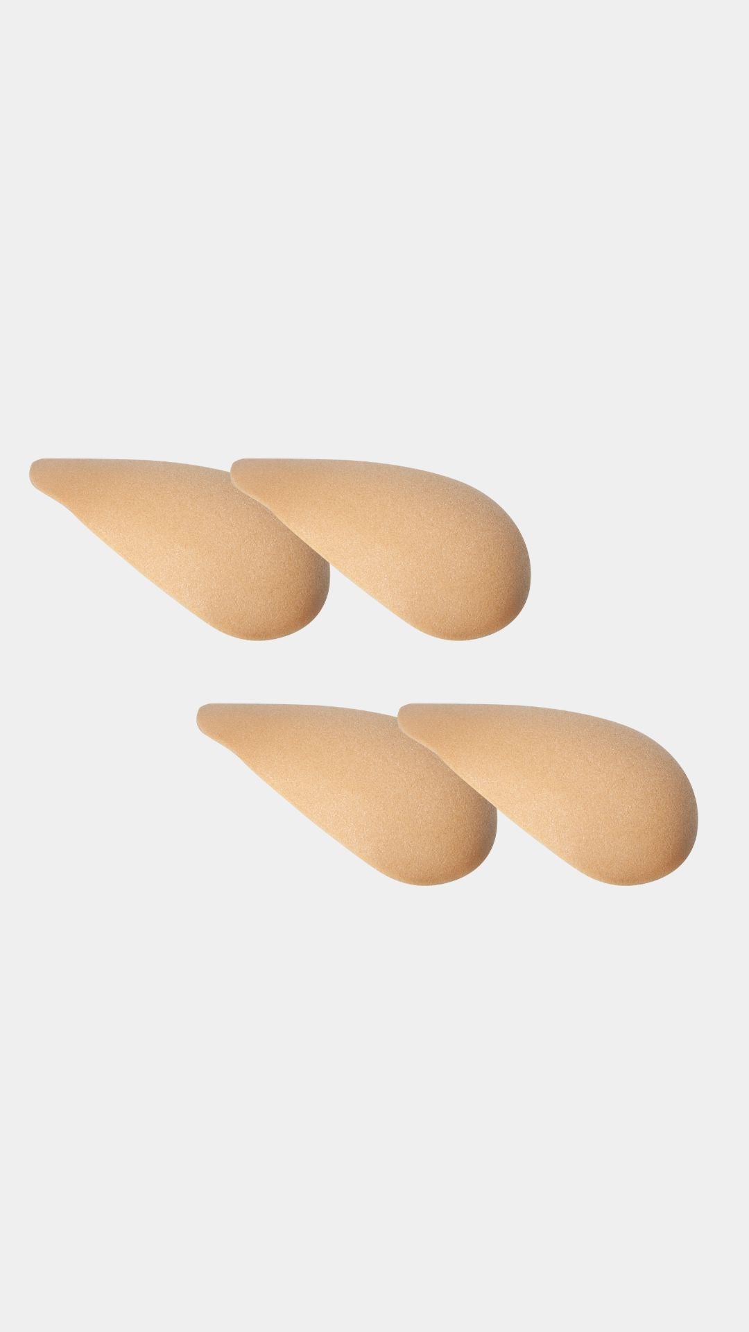 Set of four beige shoulderpads forms on a white background