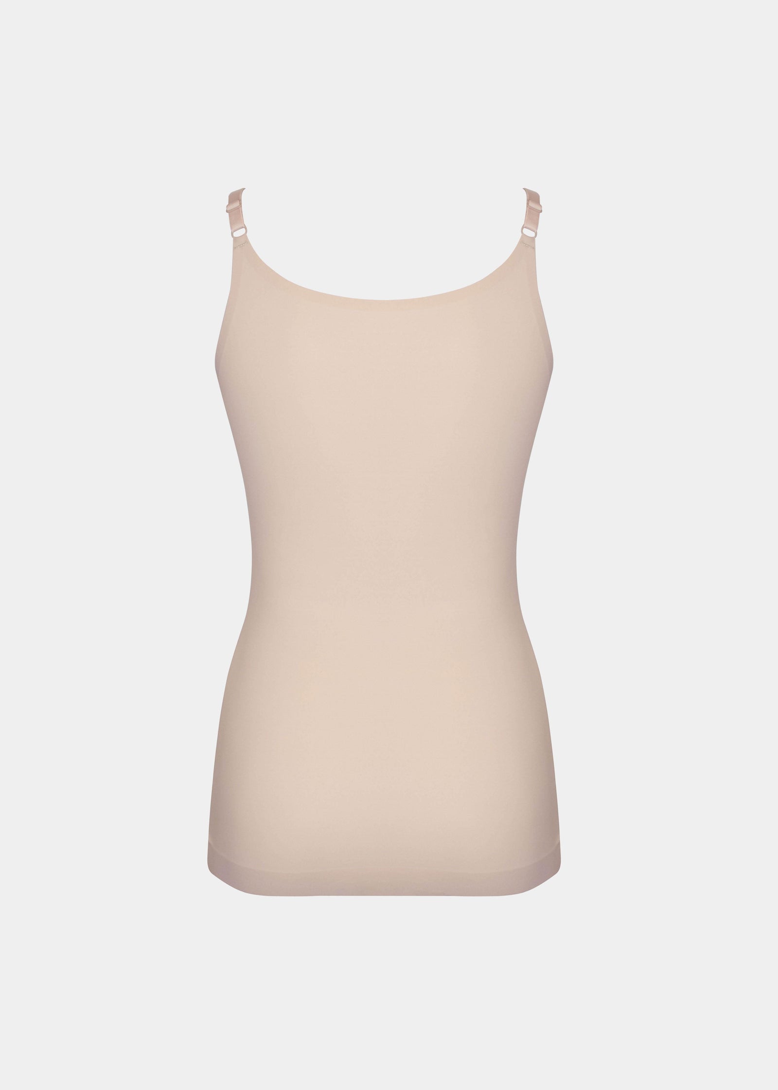 Still product image of Tone Your Body Cami in latte shown from the back. Body-contouring sleek cami with smooth powerful recycled fabric, firm shaping for lower back and waist, seamless edges, and adjustable spaghetti straps visible.
