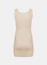Still product image of Tone Your Body Dress in latte shown from the back. Body-contouring tank dress with smooth powerful recycled fabric, firm shaping for back, hips, and legs, seamless edges, and silicone-lined leg openings visible.