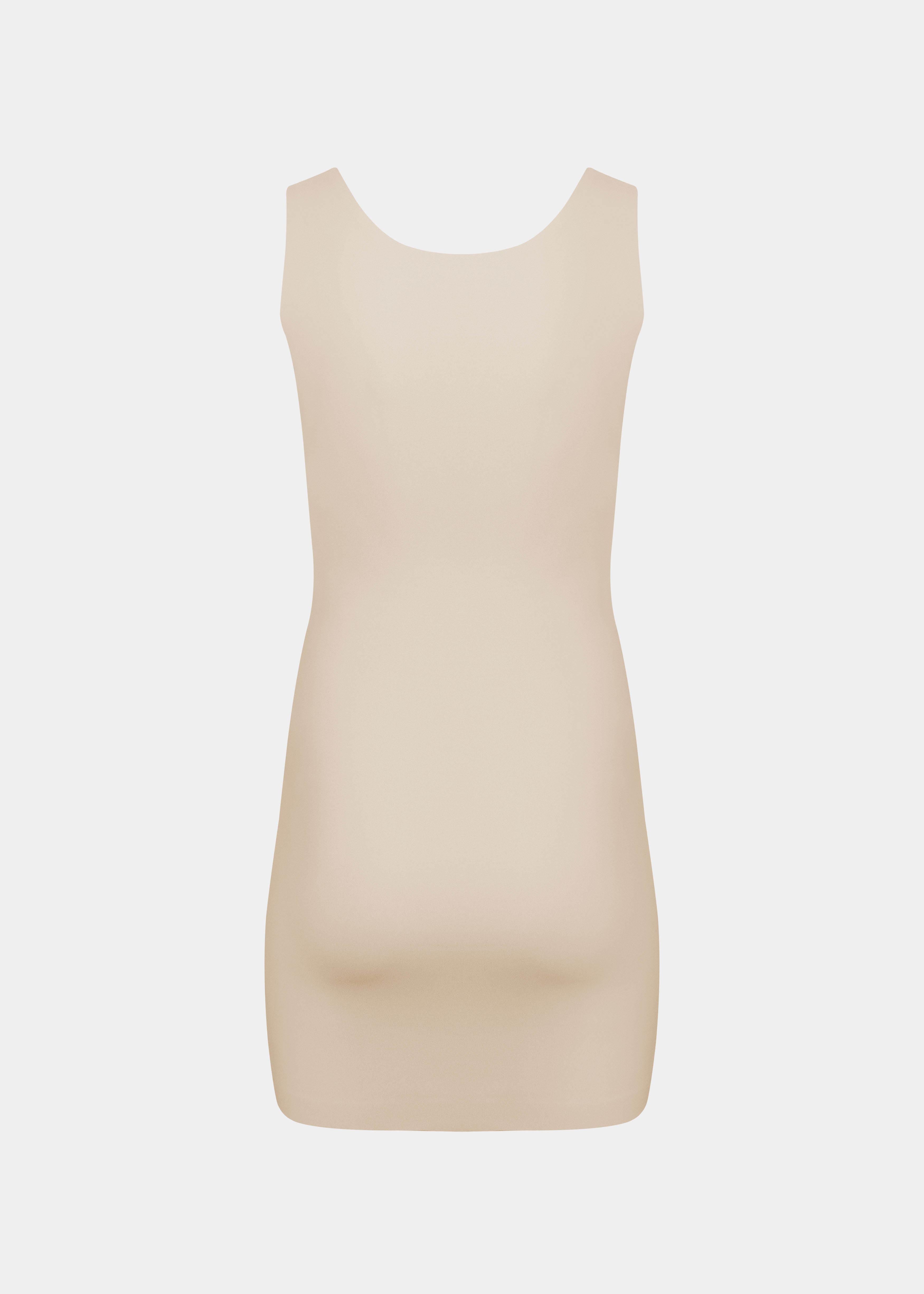 Still product image of Tone Your Body Dress in latte shown from the back. Body-contouring tank dress with smooth powerful recycled fabric, firm shaping for back, hips, and legs, seamless edges, and silicone-lined leg openings visible.