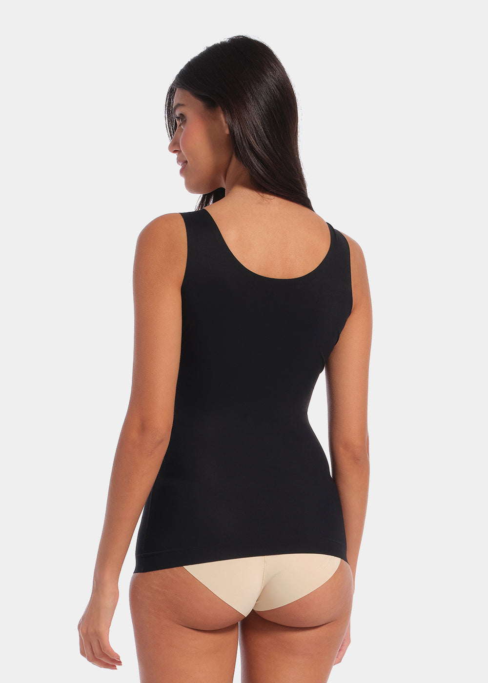 Black shaping tanktop worn by a model in a back-facing standing position, featuring firm waist and back shaping, seamless invisible finish, smooth flat edges, and strong recycled fabric for a sculpted fit.
