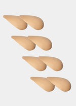 Set of beige shoulderpads on a white background