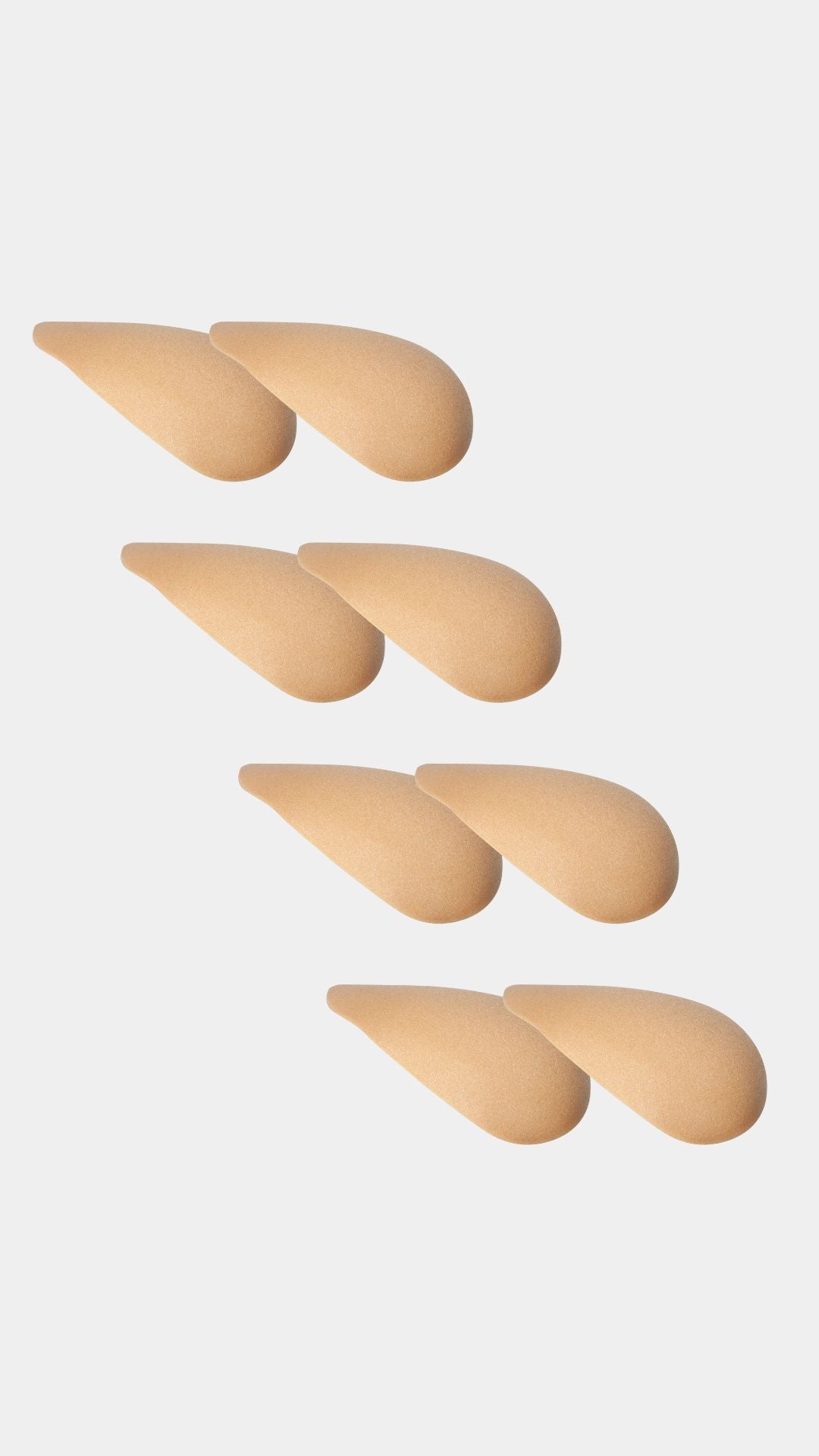 Set of beige shoulderpads on a white background
