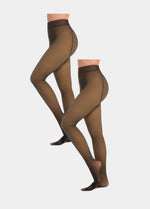 Sheer black tights worn by a model on a white background