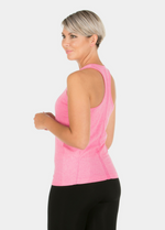 A woman wearing the pink YOGA Top from Magicbodyfashion