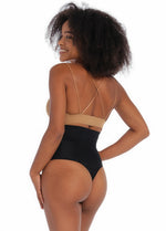 Back view of a model wearing MAGIC Ultra Thin Power Thong in black, high-waist shaping thong. Smooth breathable fabric providing light shaping for lower back and waist, with seamless edges for invisible wear under clothing.