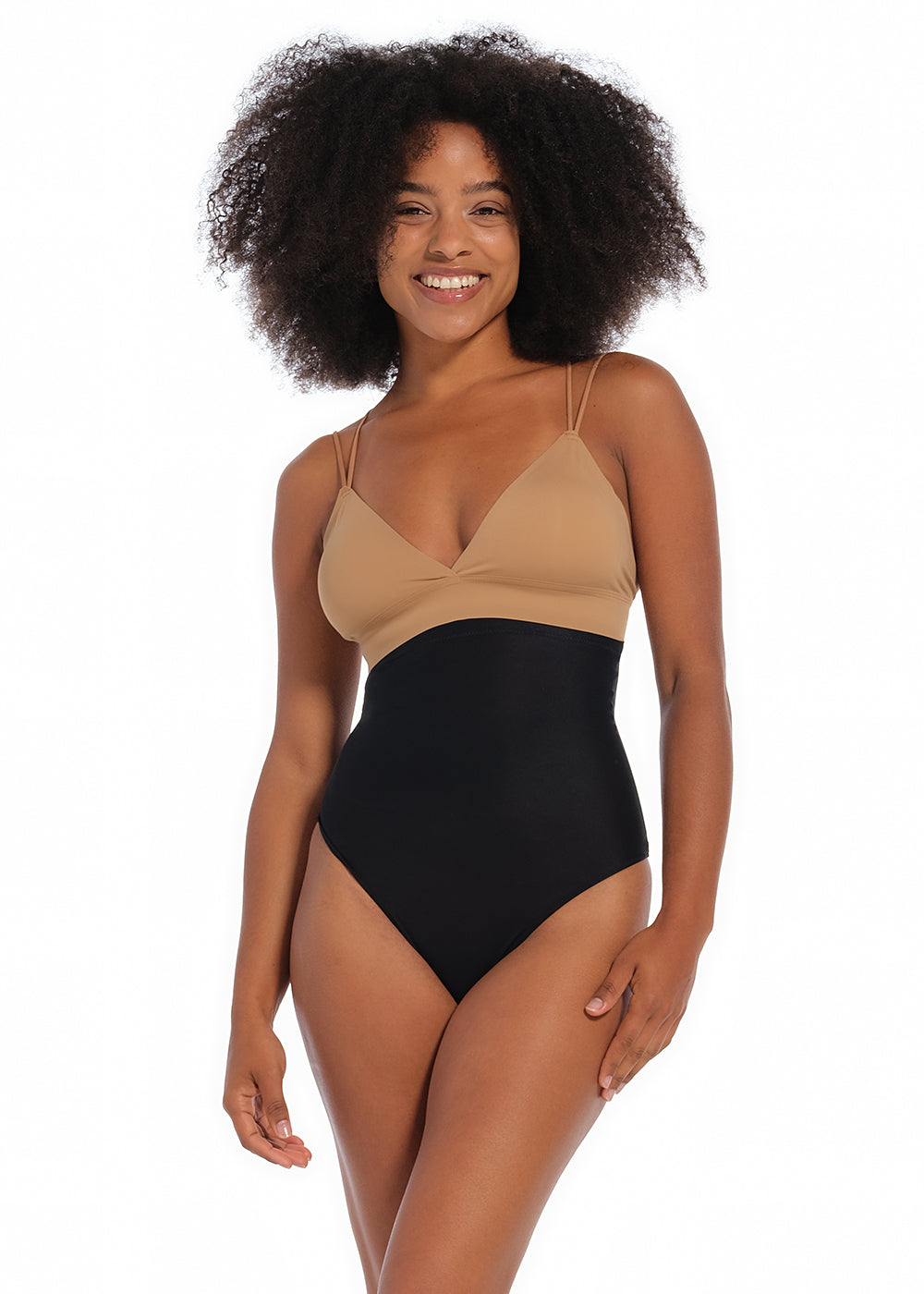 Front view of a model wearing MAGIC Ultra Thin Power Thong in black, high-waist shaping thong. Smooth breathable fabric providing light shaping for tummy, waist, and back, with seamless edges for invisible wear under clothing.