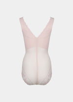 Light pink bodysuit on a white background
