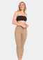 Front view of a model wearing Warm Fleece-Lined MAGIC Leggings in sunshine, high-waist fleece-lined leggings. Smooth fabric providing medium shaping and tummy support, ladder-resistant finish, and translucent-look legs visible.