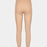 Still product image of MAGIC Tights in latte shown from the back. High-waist warm fleece-lined tights with smooth fabric providing medium shaping for lower back and waist, ladder-resistant finish, and sheer-look legs with unfleece foot section visible.