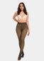 A model wearing high-waisted, fleece-lined brown tights with a sheer appearance. She is also wearing a white bra.