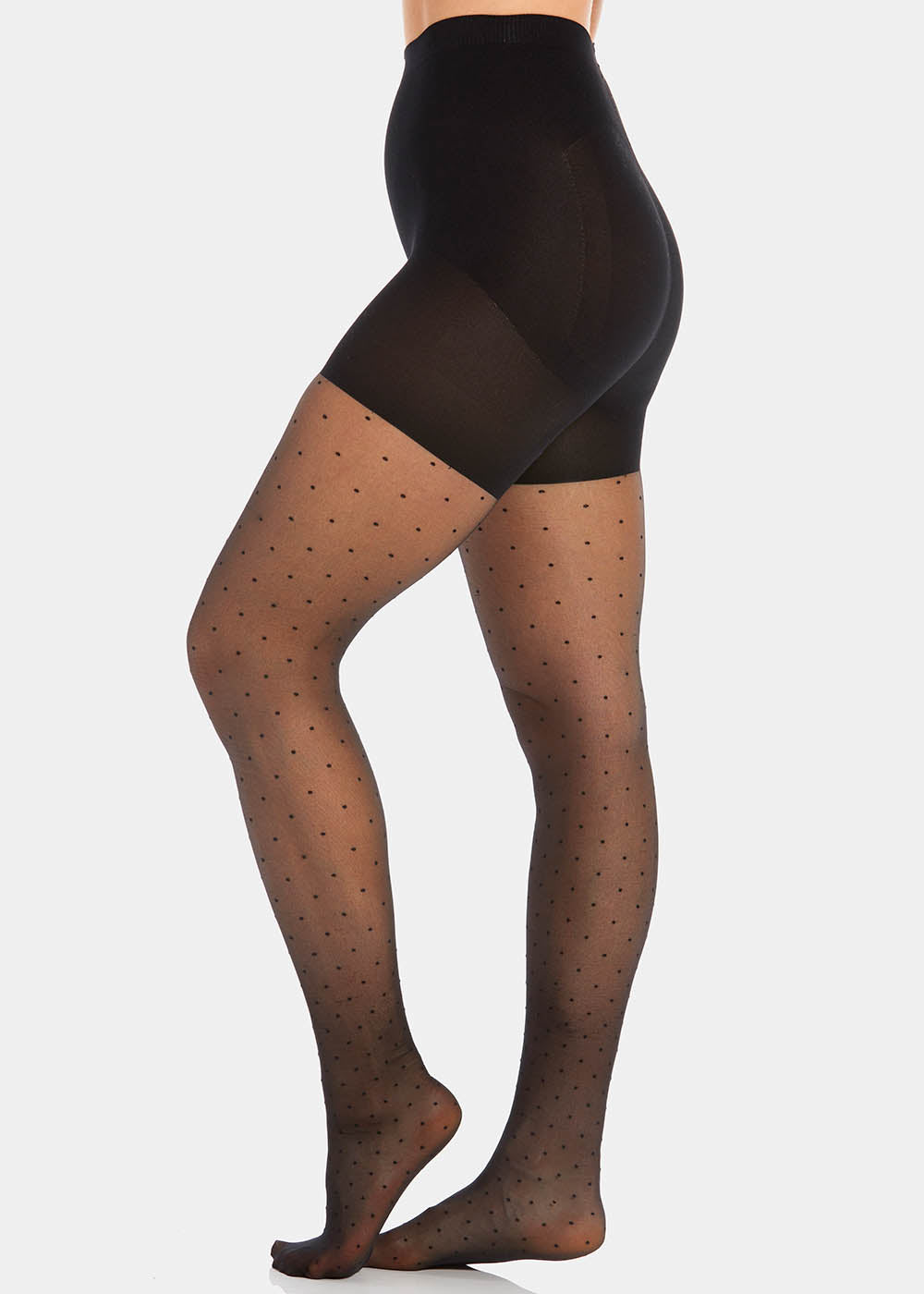 Front view close-up of a model wearing Sexy Dots shaping tights in black, 20 denier sheer tights with dot pattern. Built-in firm shaping shorts providing control for tummy, hips, and upper legs, with subtle lift at the bottom and reinforced toes visible.