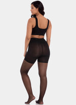 Back view of a model wearing Sexy Legs tights in black, 30 denier shaping tights. Built-in firm shaping shorts providing control for lower back, hips, and upper legs, with subtle lift at the bottom and smooth finish along the legs.