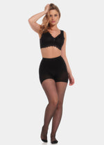 Front view of a model wearing Spectacular Legs in black, 20 denier shaping tights. Built-in firm shaping shorts providing control for tummy, hips, and upper legs, with subtle lift at the bottom and smooth sheer finish on the legs.