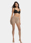 Front view of a model wearing Spectacular Legs in sunkissed, 20 denier shaping tights. Built-in firm shaping shorts providing control for tummy, hips, and upper legs, with subtle lift at the bottom and smooth sheer finish on the legs.