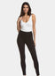 Front view of a model wearing Jegging in black, high-waist skinny-fit leggings with built-in shaping briefs. Soft stretchy fabric providing medium shaping for tummy, hips, and back, with cotton gusset, lifted bottom zone, and faux front and functional back pockets visible.