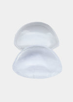 Still product image of the silicone Swim Push Up pads, showcasing the pair of push-up inserts with smooth silicone surface and adhesive backing for secure placement inside swimwear.
