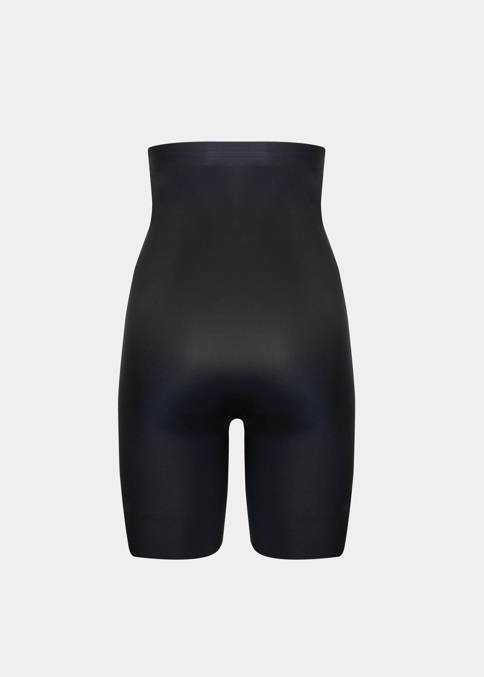 Still product image of Maxi Sexy Hi-Bermuda in black shown from the back. High-waist mid-thigh shaping shorts with smooth powerful fabric, firm control for lower back, hips, and thighs, seamless edges, and silicone-trimmed waistband visible.