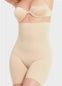 A woman wearing a high-waisted black shapewear Bermuda that extends to mid-thigh.