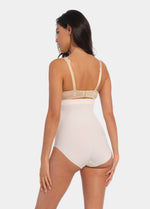Back view of a model wearing Maxi Sexy Hi-Brief in barista, high-waist shaping brief. Smooth powerful fabric with firm control for lower back and waist, seamless edges, and silicone-trimmed waistband visible.