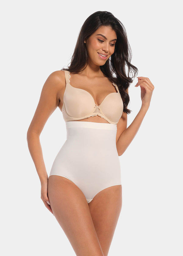 Front view of a model wearing Maxi Sexy Hi-Brief in barista, high-waist shaping brief. Smooth powerful fabric providing firm control for tummy, waist, and back, with seamless edges and silicone-trimmed waistband visible.