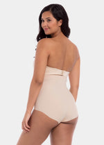 Back view of a model wearing Maxi Sexy Hi-Brief in latte, high-waist shaping brief. Smooth powerful fabric with firm control for lower back and waist, seamless edges, and silicone-trimmed waistband visible.