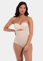 Front view of a model wearing Maxi Sexy Hi-Brief in latte, high-waist shaping brief. Smooth powerful fabric providing firm control for tummy, waist, and back, with seamless edges and silicone-trimmed waistband visible.