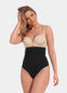 Front view of a model wearing Maxi Sexy Hi-Thong in black, high-waist shaping thong. Smooth powerful fabric providing firm control for tummy, waist, and back, with seamless edges and silicone-trimmed waistband visible.