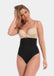 Front view of a model wearing Maxi Sexy Hi-Thong in black, high-waist shaping thong. Smooth powerful fabric providing firm control for tummy, waist, and back, with seamless edges and silicone-trimmed waistband visible.