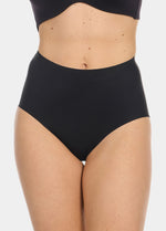 Front view cropped image of a model wearing Maxi Sexy Shaping Brief in black, high-waist shaping brief. Smooth strong recycled fabric providing firm control for tummy, waist, and back, with seamless edges for invisible wear under clothing.